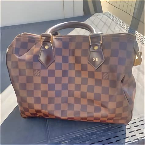 bauletto louis vuitton originale usato|farfetch louis vuitton.